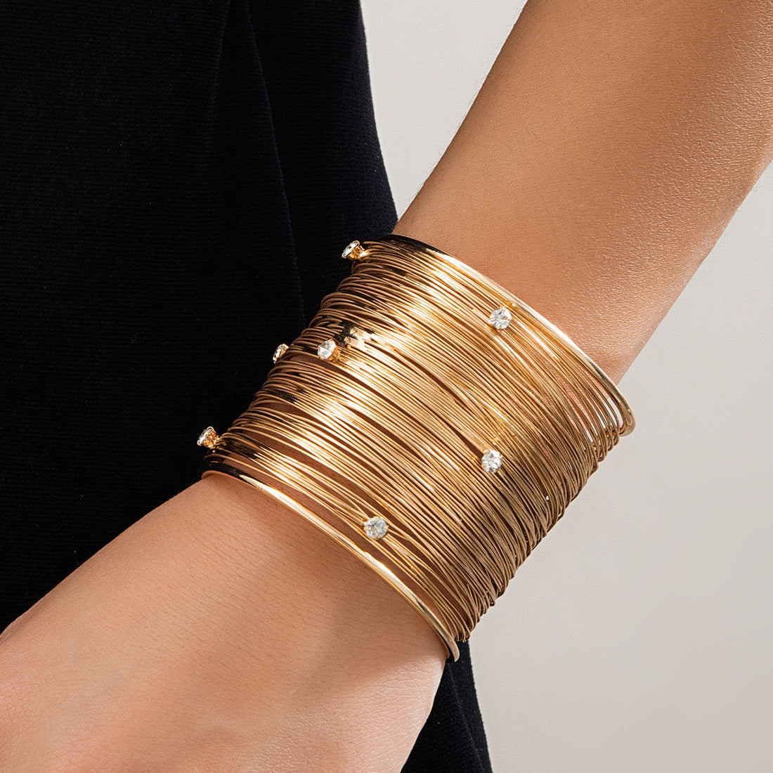 Star-studded coiled Handcuff