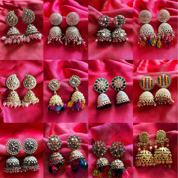 various styles of traditional Indian jhumka earrings.