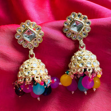 pair of Sukkhi gold-plated multicolor stone jhumki earrings.