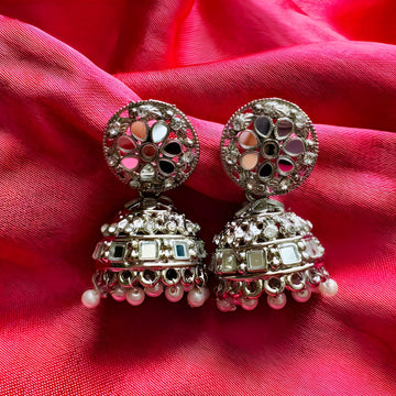 pair of oxidised silver mirror work jhumka earrings