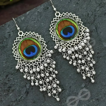 pair of oxidised silver peacock feather jhumka earrings with bells